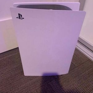 Ps5 with 2 controllers, headset and is nearly new and is in good condition